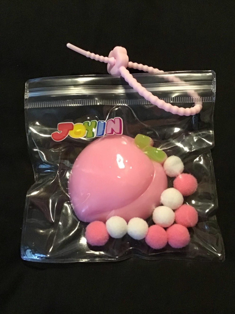 Pink Peach Squishy Keychain Toy with Pom-Pom Accessory